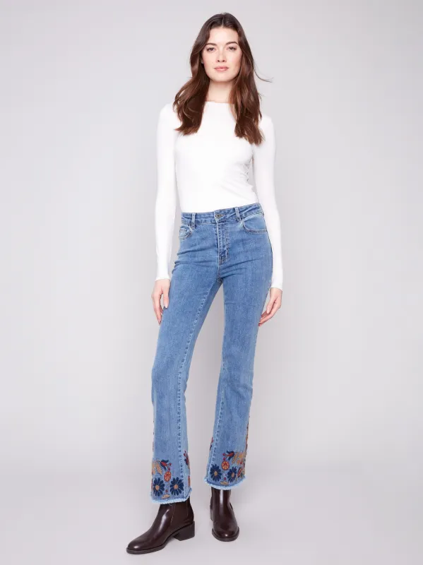 Flare Leg Jeans With Colorful Floral Embroidery - Medium Blue sold by Charlie B