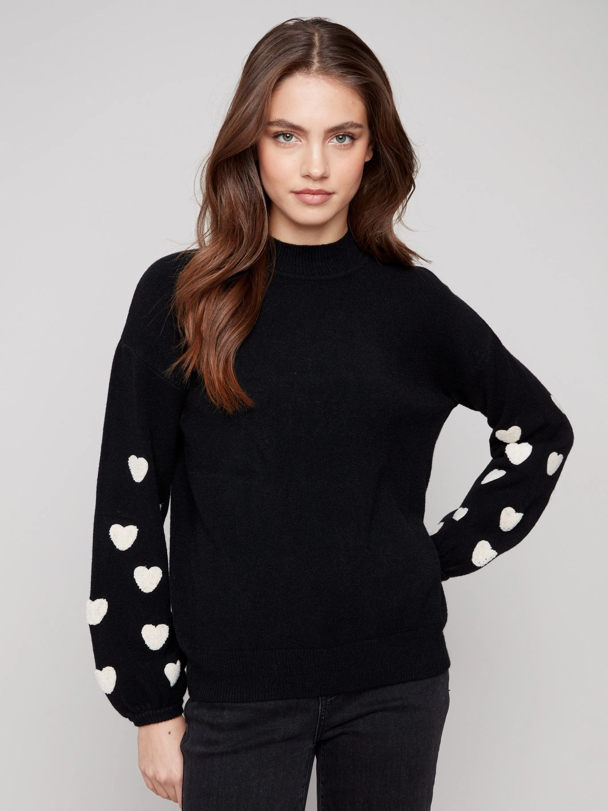 Mock Neck Sweater With Embroidered Hearts - Black sold by Charlie B