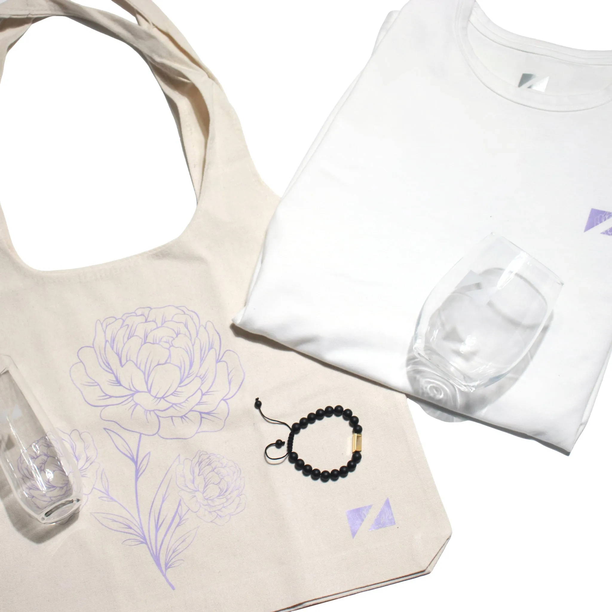 Bundle 1: The Luxe Carnation Tee + The Carnation Tote + Unwine Stemless Glass and Flute Bundle + Zueike Elements Bracelet sold by Zueike