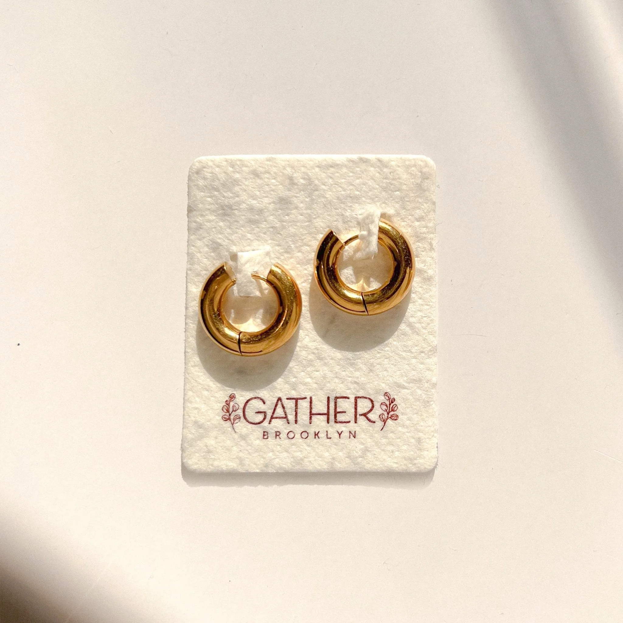 Chunky Gold Huggie Hoops sold by Gather Brooklyn product image thumbnail 2
