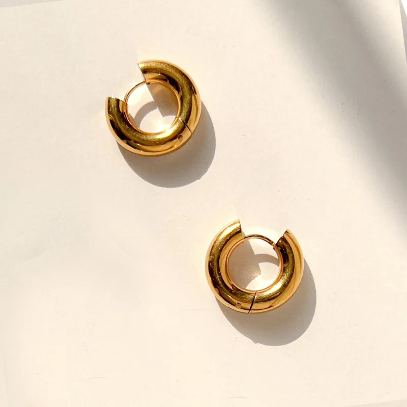 Chunky Gold Huggie Hoops sold by Gather Brooklyn