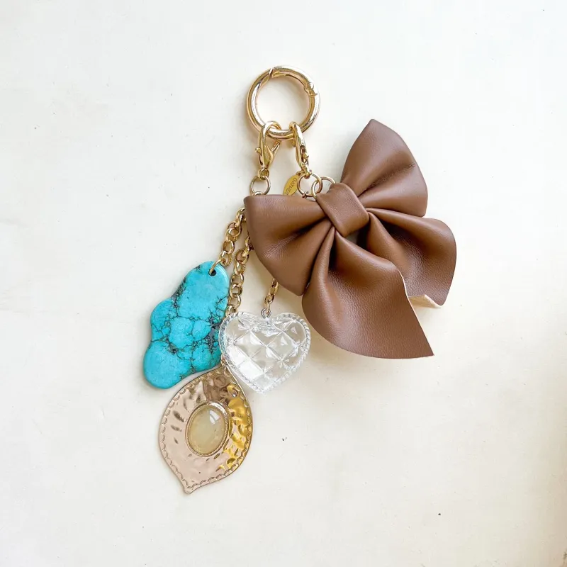 Dream Bow Bag Charm sold by Gather Brooklyn