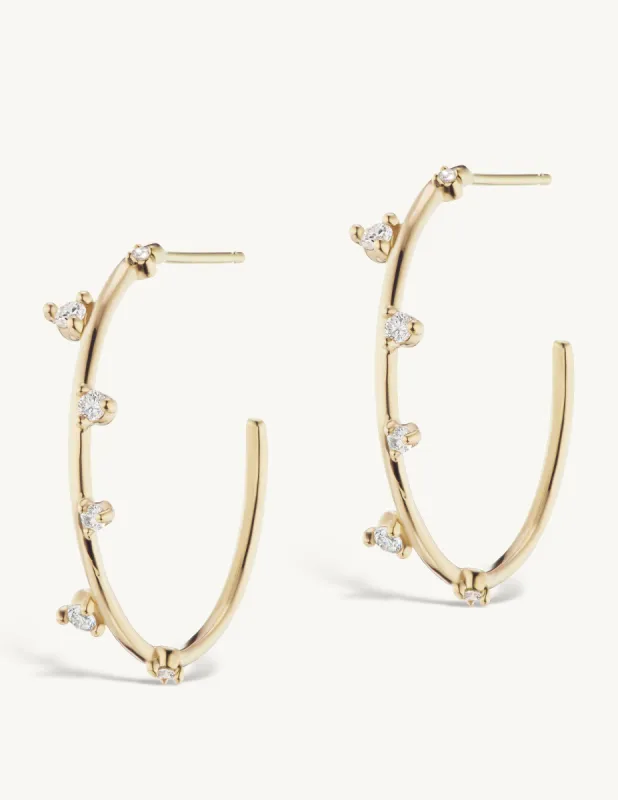 Small Scatter Hoops sold by Sophie Ratner