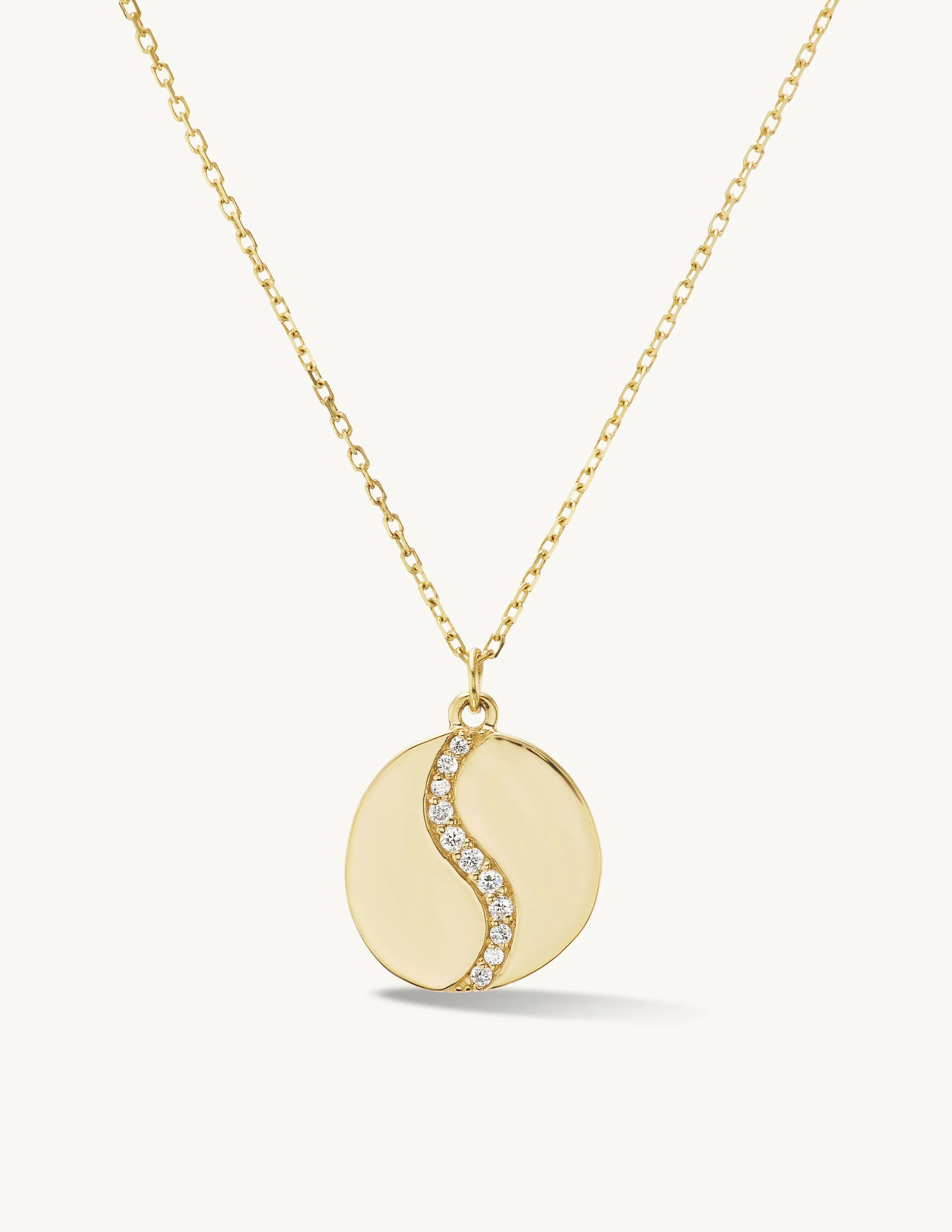 Pave Sway Disk Pendant sold by Sophie Ratner