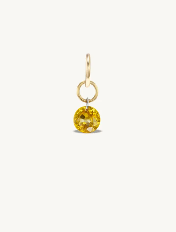 Small Round Pierced Dark Yellow Sapphire Charm for Chains sold by Sophie Ratner