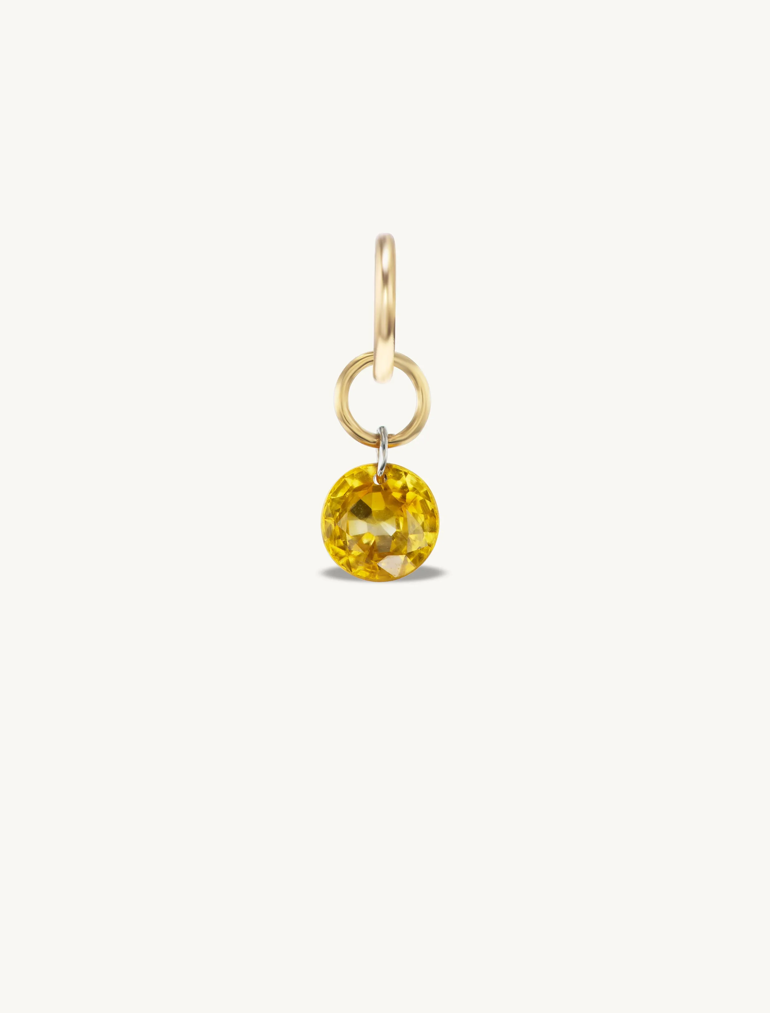 Small Round Pierced Dark Yellow Sapphire Charm for Chains sold by Sophie Ratner