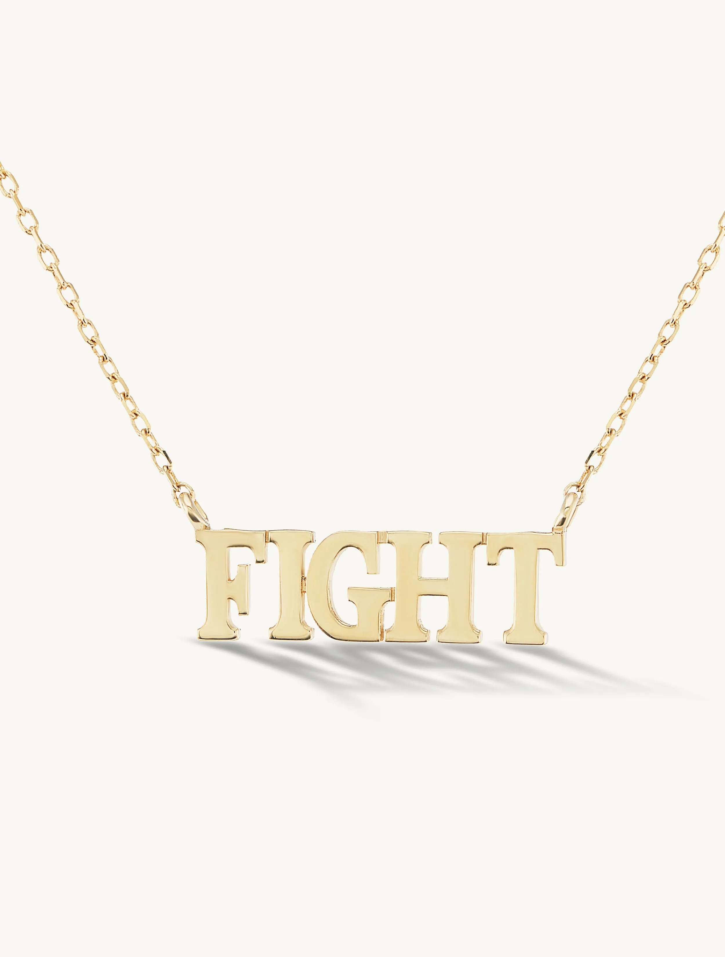 Fight Gold Necklace sold by Sophie Ratner