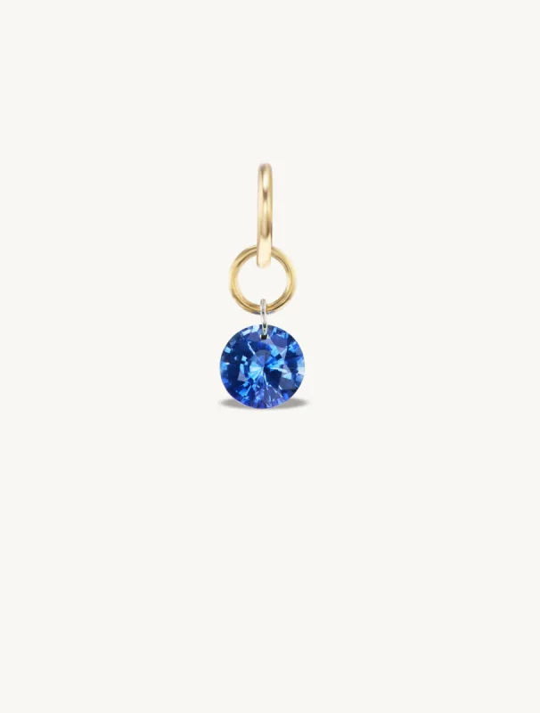 Small Round Pierced Blue Sapphire Charm for Chains sold by Sophie Ratner