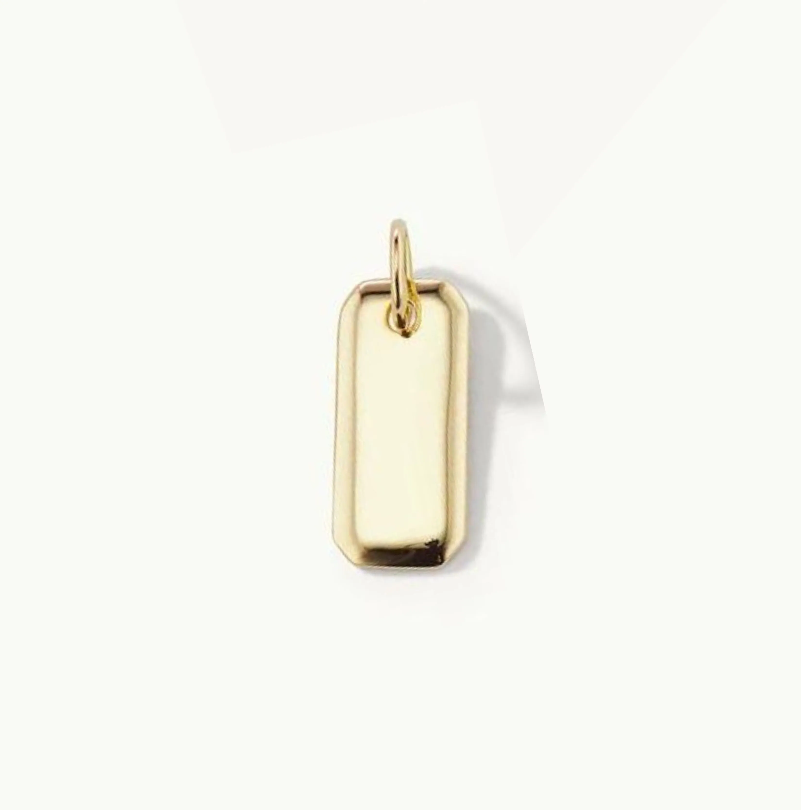 Engraved Initial Tag Charm sold by Sophie Ratner