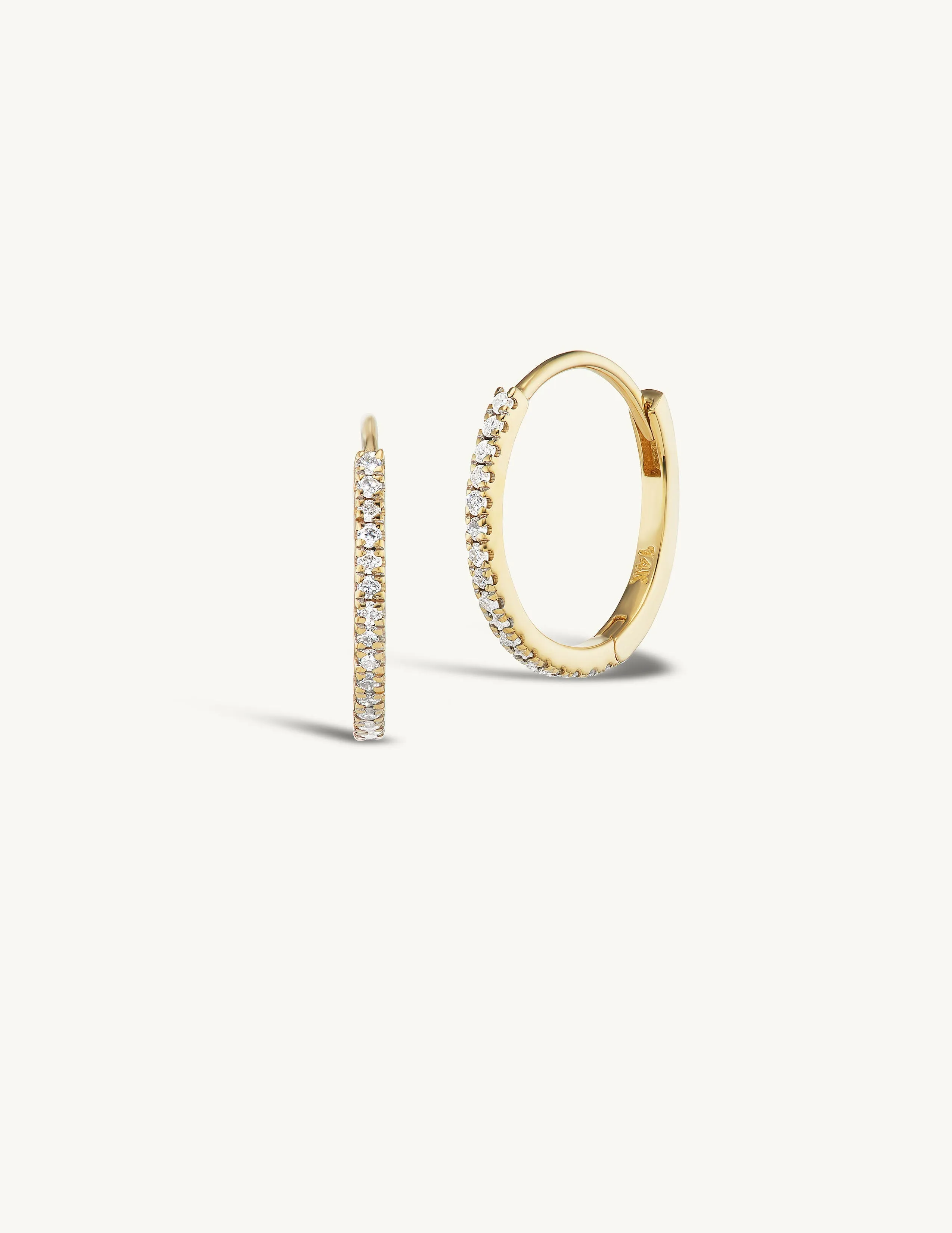 12mm Pave Huggies + Free Mini Round Diamond Charms sold by Sophie Ratner