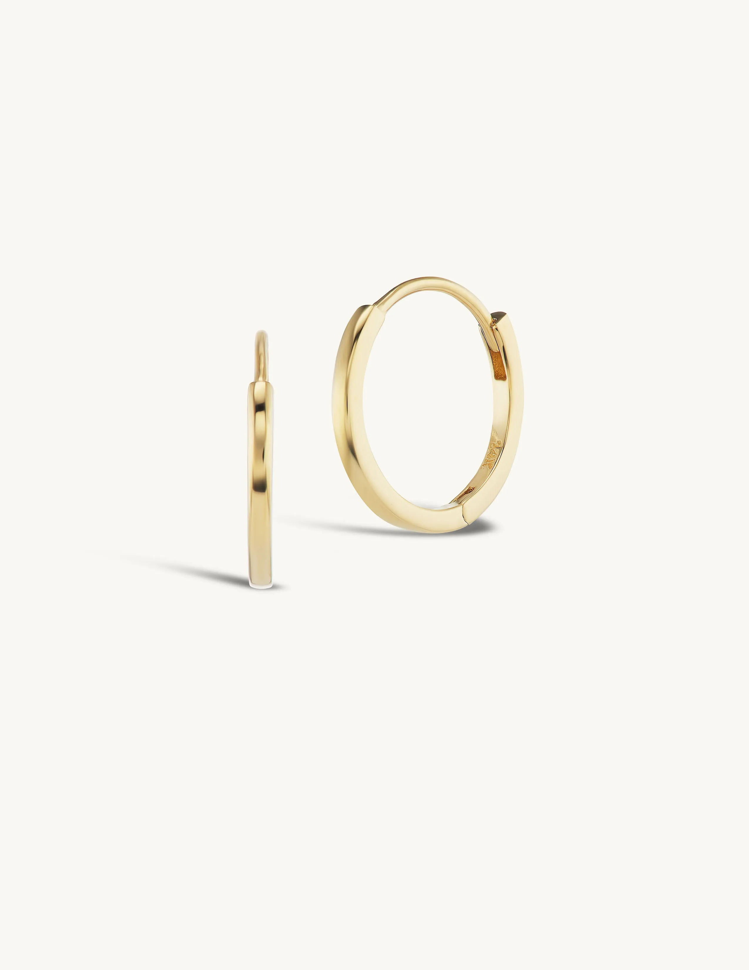 12mm Gold Huggies + Free Mini Diamond Charms sold by Sophie Ratner