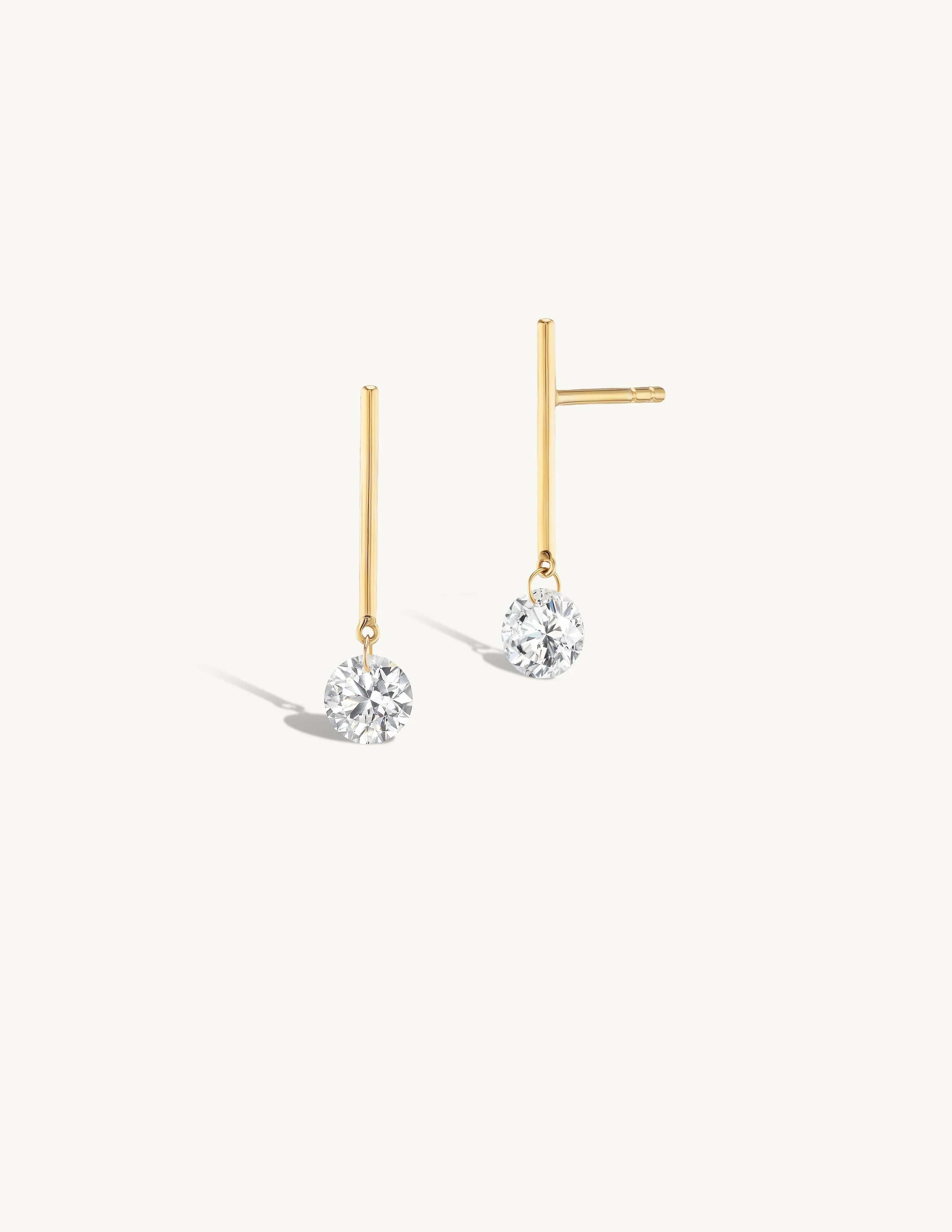 1/2 Carat Round Pierced Diamond & Gold Bar Earring sold by Sophie Ratner