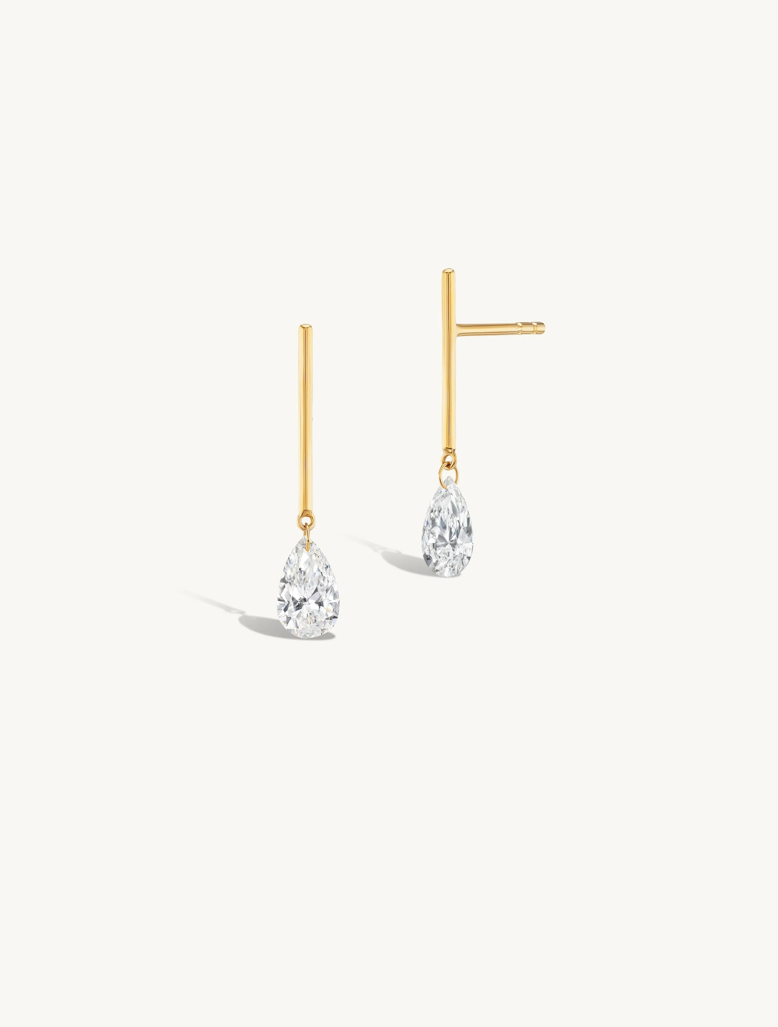 1/2 Carat Pear Pierced Diamond & Gold Bar Earring sold by Sophie Ratner