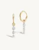 Triple Pierced Diamond Gold Huggies sold by Sophie Ratner