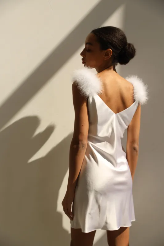 Lia - White short with feather straps sold by The Robe