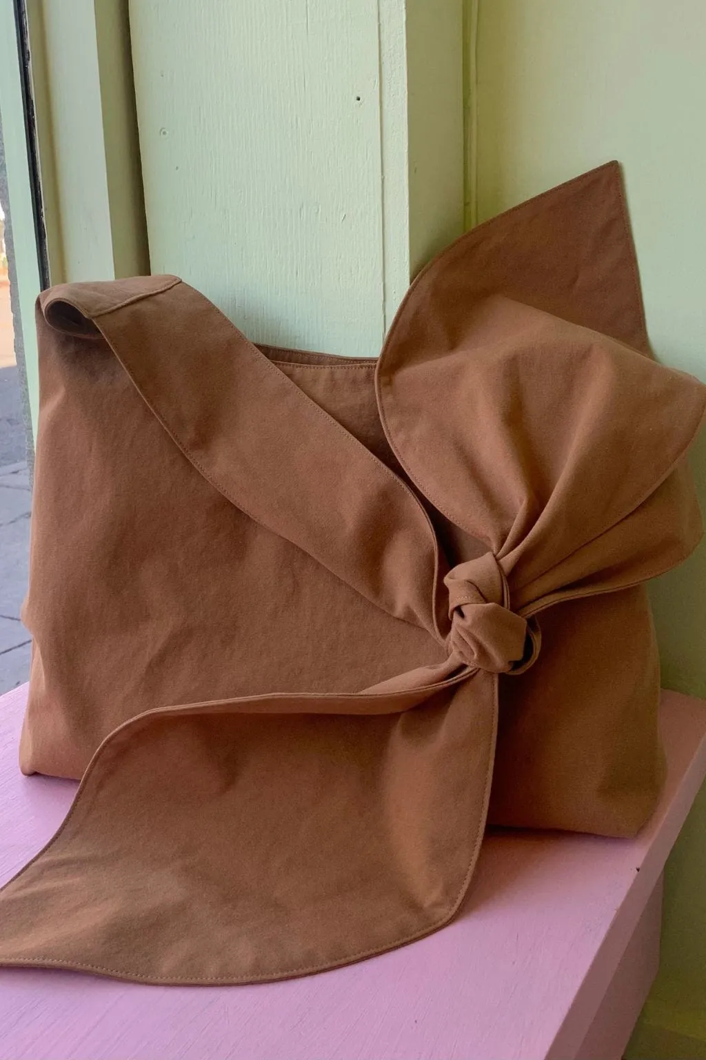 Bunni Bow Bag Camel sold by Eliza Faulkner