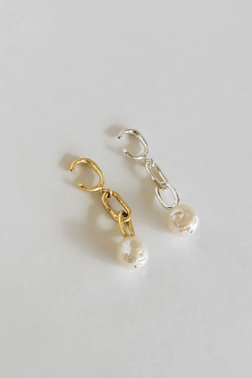 ORAC Pendulum Earcuf Silver sold by Eliza Faulkner