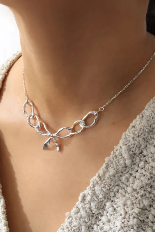 ORAC Bow Realis Silver Necklace made by Eliza Faulkner