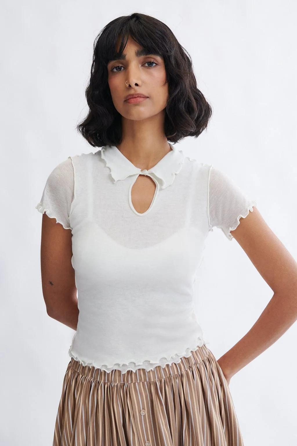 Percy Polo Top in White sold by Eliza Faulkner