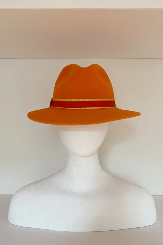 Bright orange fedora with yellow and orange trims (SIZE MEDIUM) sold by Heirloom Hats