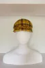 Bubbly black and yellow plaid mod cap (SIZE MEDIUM) sold by Heirloom Hats