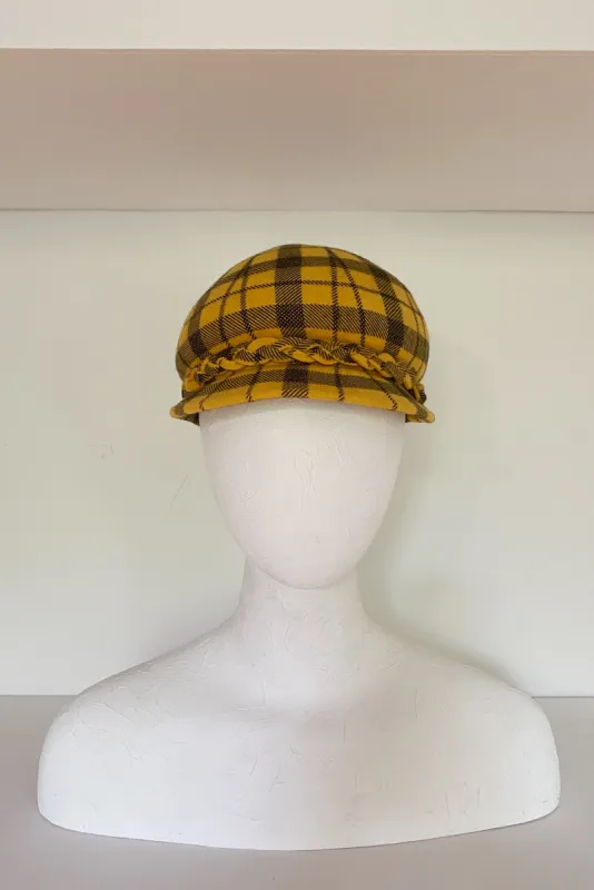 Bubbly black and yellow plaid mod cap (SIZE MEDIUM) sold by Heirloom Hats