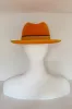 Bright orange fedora with orange grosgrain and brown ricrac (SIZE LARGE) sold by Heirloom Hats