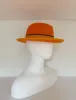 Bright orange fedora with orange grosgrain and brown ricrac (SIZE LARGE) sold by Heirloom Hats