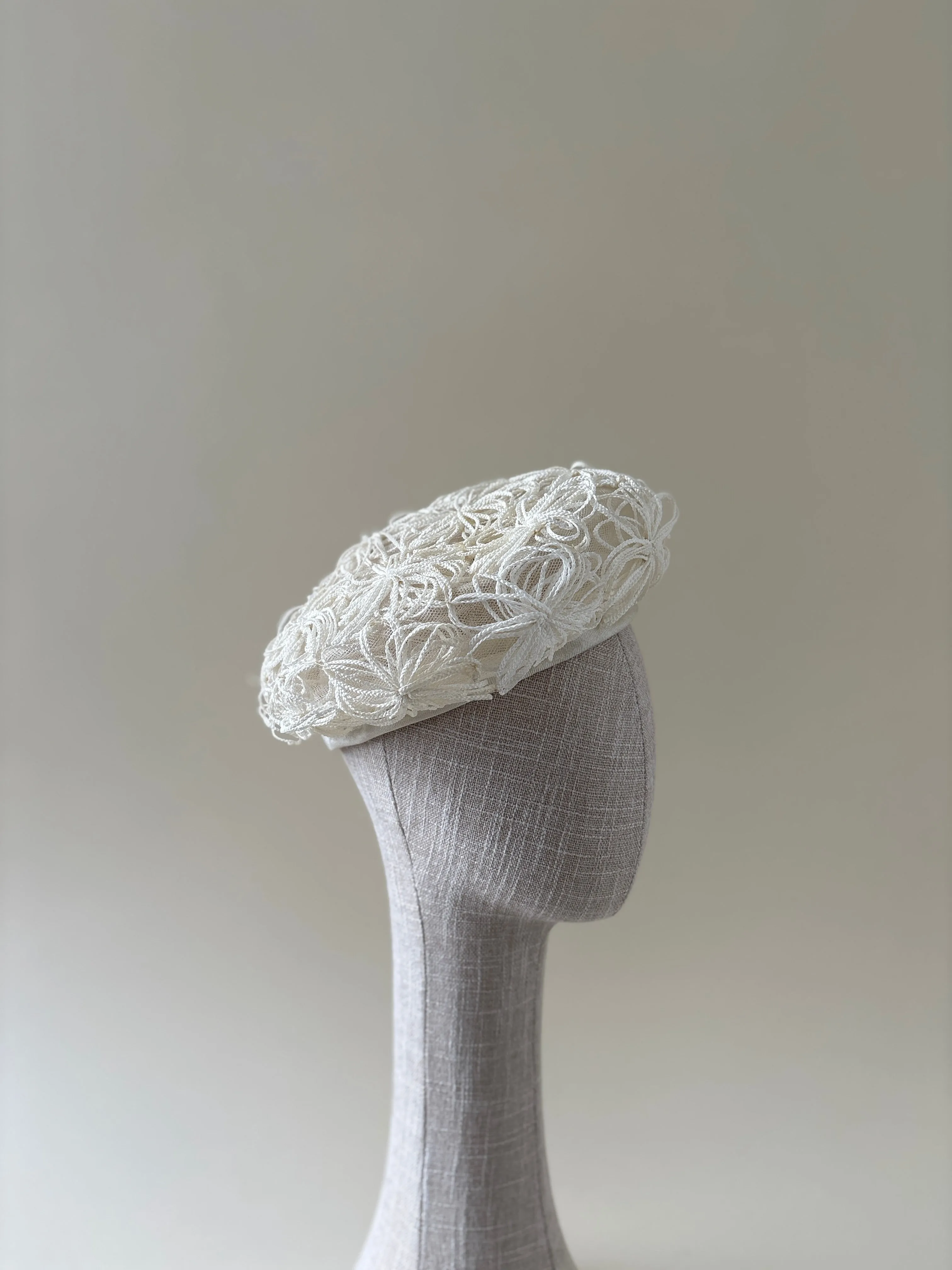 Vintage hat #011 | 1960's white tulle beret with white straw flower details sold by Heirloom Hats product image thumbnail 2