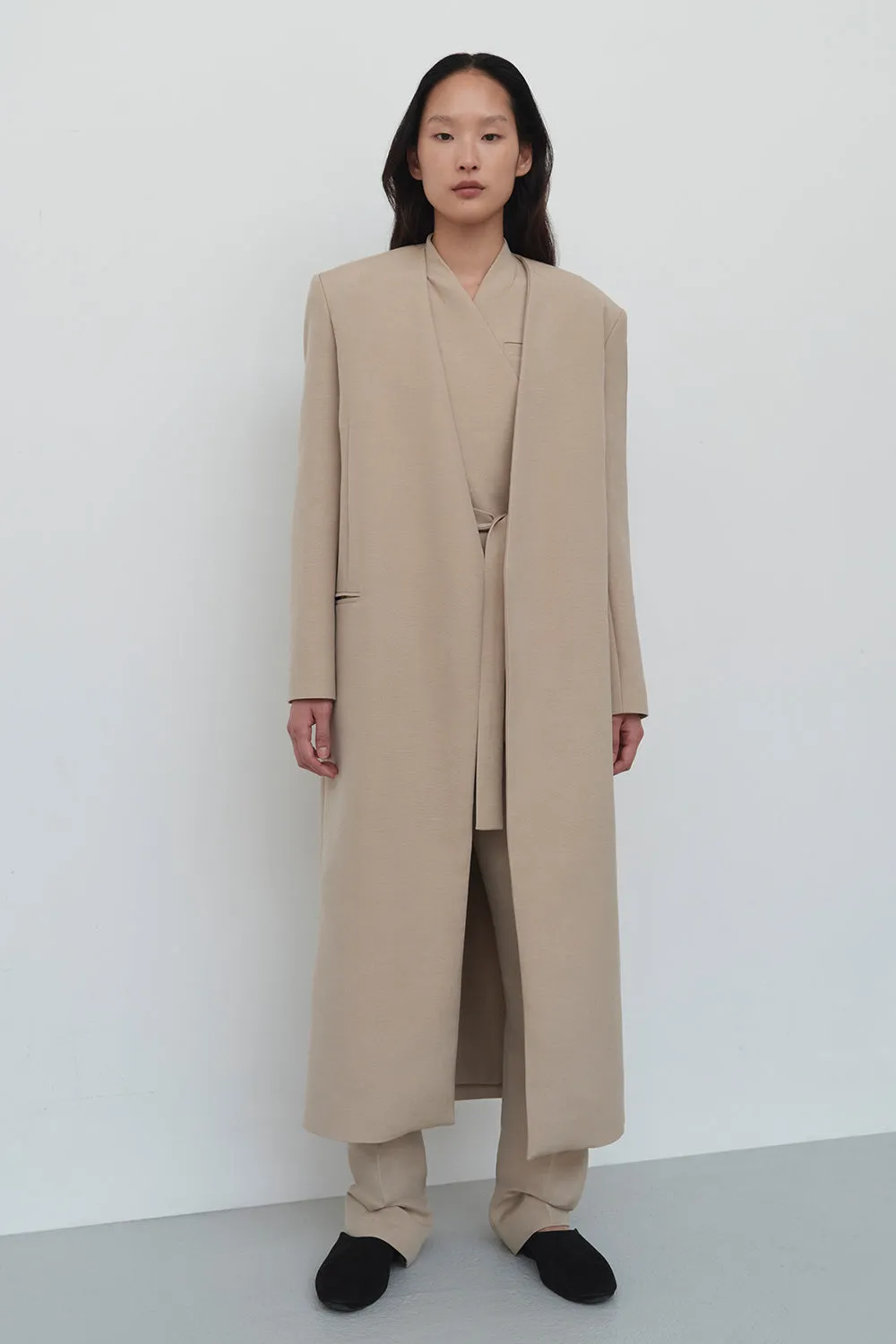 Allegra Coat Dark Camel sold by TOVE