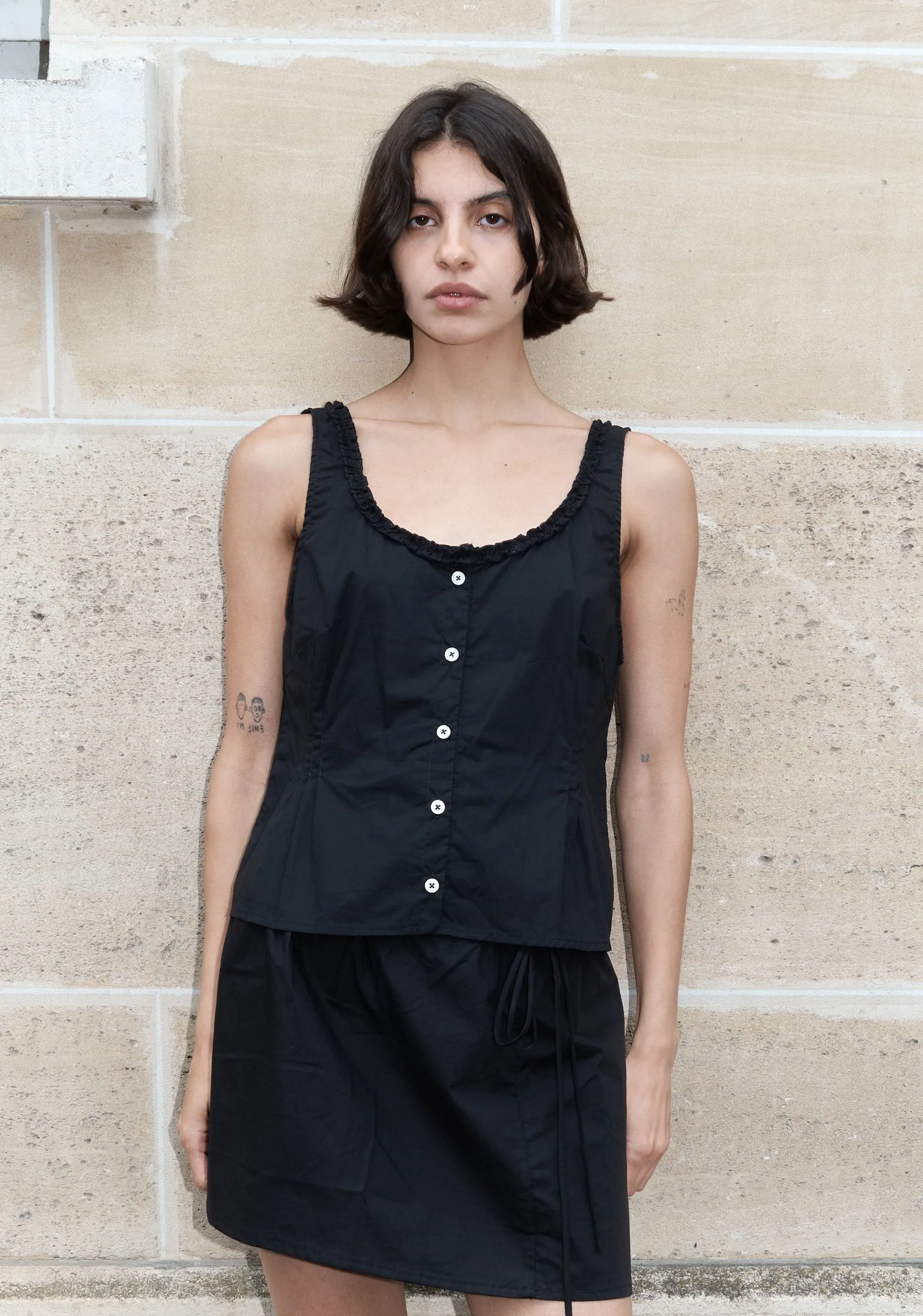 Ruffle top sold by Deiji Studios