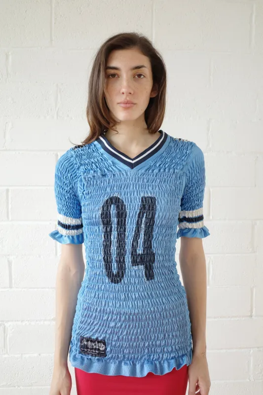 The Reconstituted Shirred US Football Top made by Conner Ives