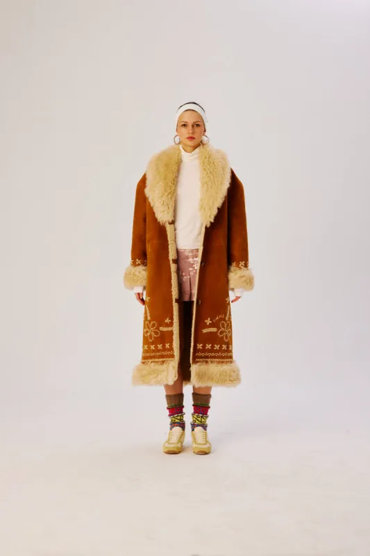 KENY - Embroidered shearling trimmed coat sold by Siedres