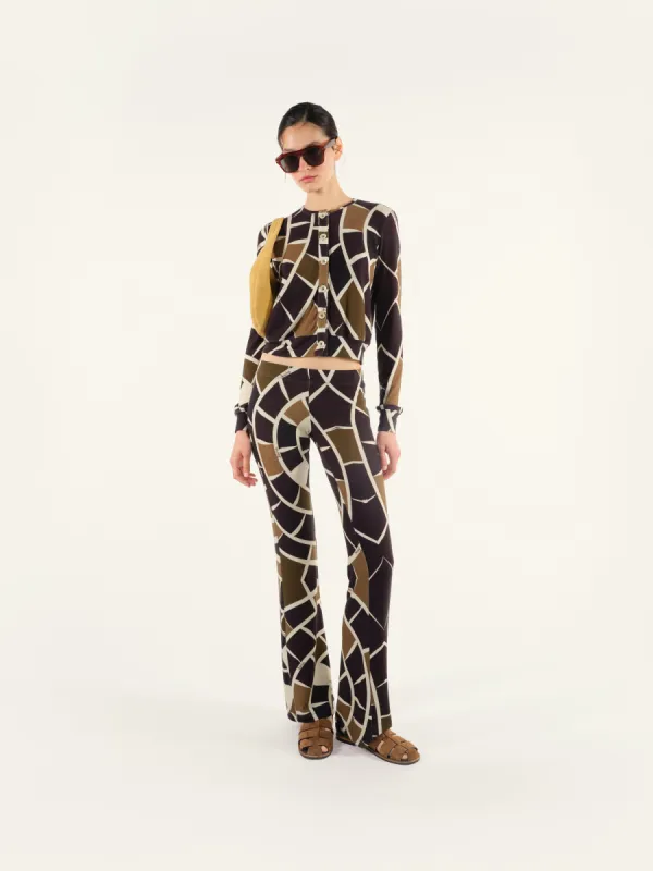 FLO - Kaleidoscope printed flare-leg pants sold by Siedres