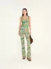 FLO - Floral printed flare-leg pants sold by Siedres