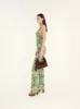 FLO - Floral printed flare-leg pants sold by Siedres