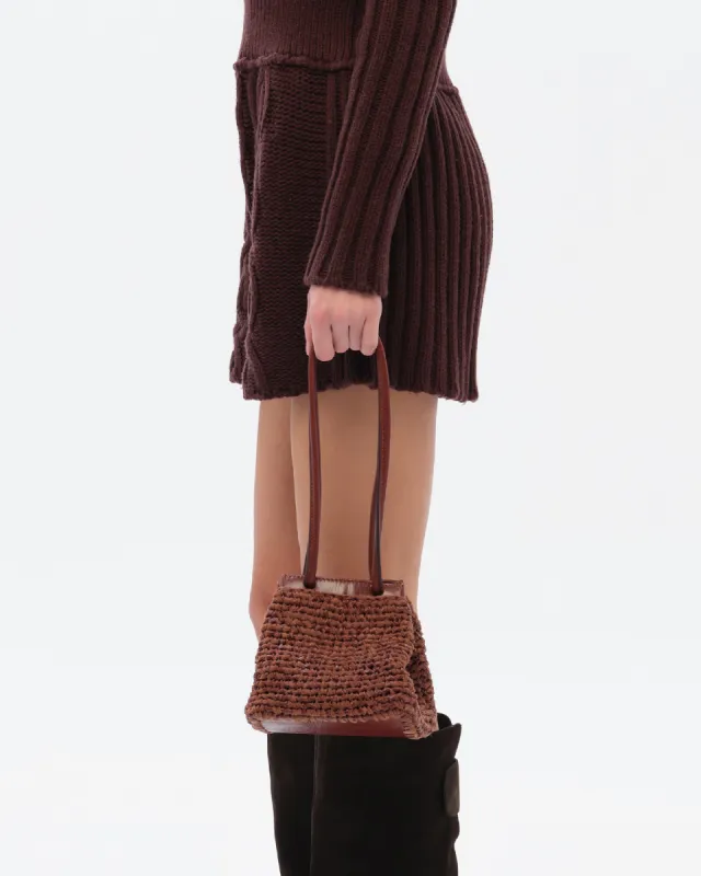 TIA - Leather woven shoulder bag sold by Siedres