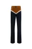JESSI - Color-block jeans with ruffle detail sold by Siedres