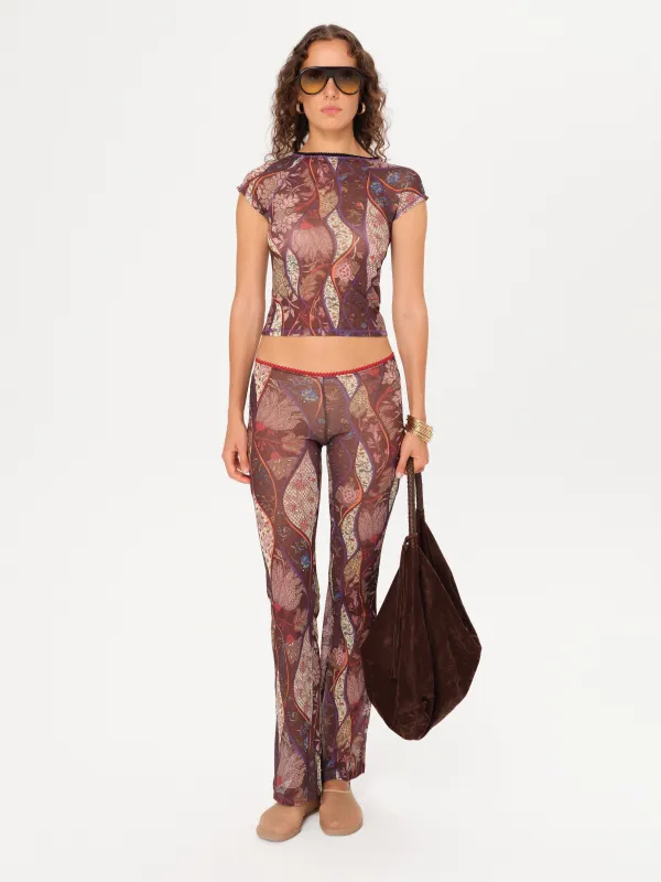 FLO - Printed flare leg pants sold by Siedres