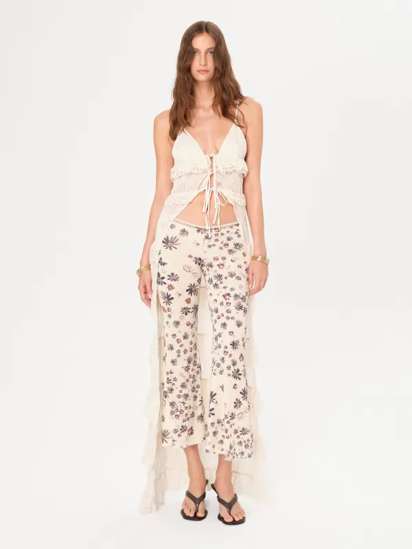 JESLYNN - Floral-printed flare-leg pants sold by Siedres