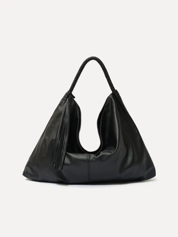 GALIA - Oversized tote bag with woven handle and removable tassel charm sold by Siedres