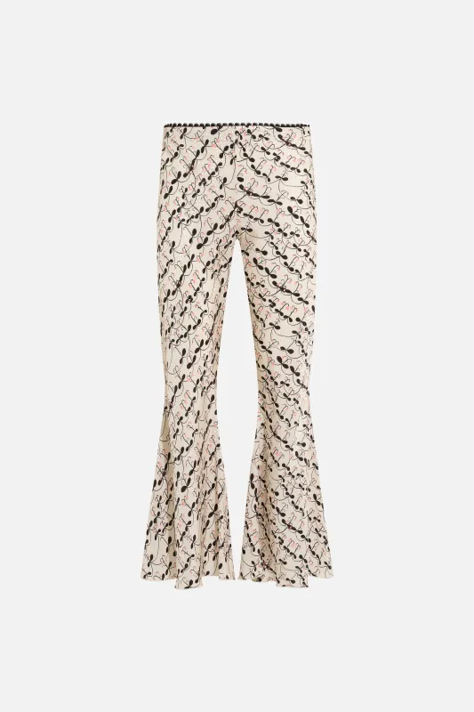 JESLYNN - Low-rise printed satin flare pants sold by Siedres