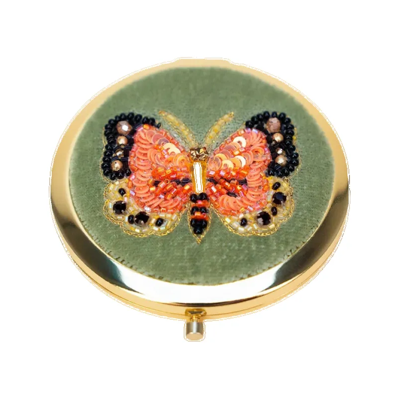 Powder Mirror Compact sold by Coes