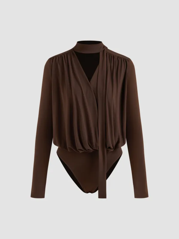 V-neck Solid Ruched Oversized Long Sleeve Bodysuit sold by Cider