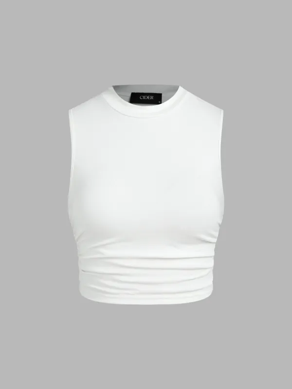 Round Neckline Solid Sleeveless Ruched Crop Top sold by Cider