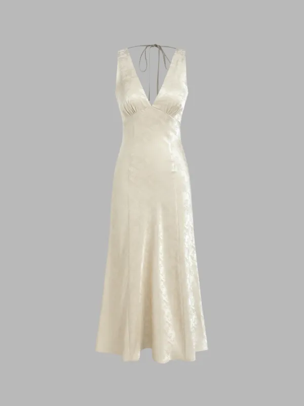 Satin Floral V-neck Knotted Ruffle Maxi Dress sold by Cider