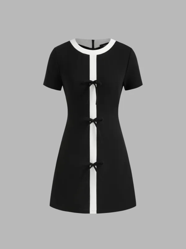 Round Neckline Contrasting Binding Bowknot Mini Dress sold by Cider