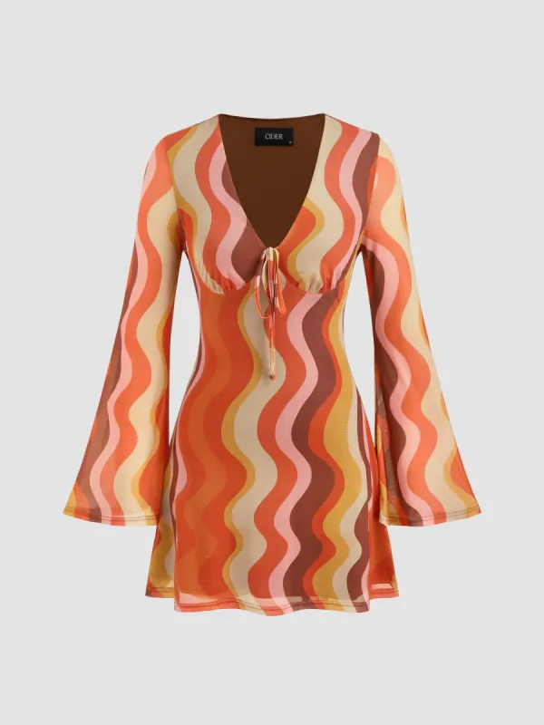 Mesh V-neck Abstract Wave Knotted Mini Dress sold by Cider