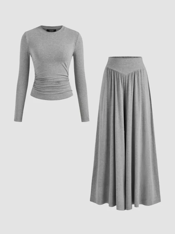 Round Neckline Solid Ruched Long Sleeve Top & Mid Rise Ruffle Hem Maxi Skirt Set sold by Cider