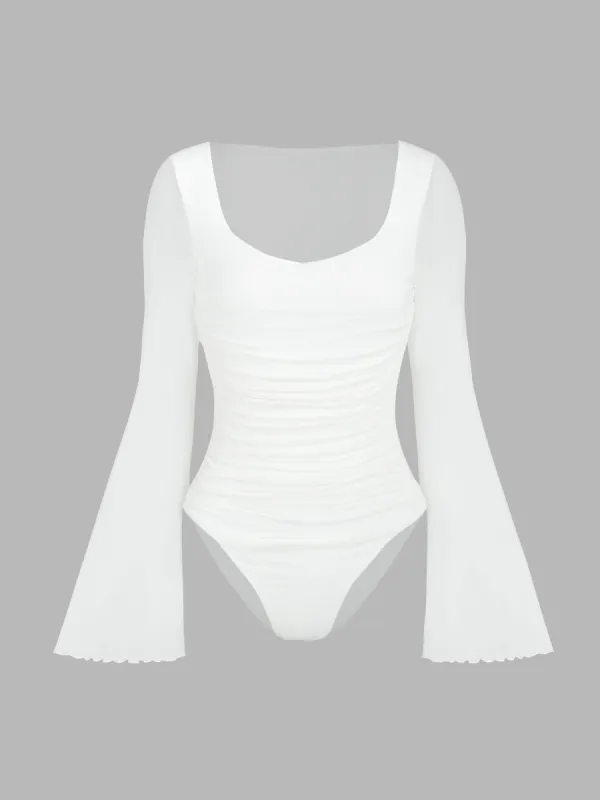 Solid Mesh Bell Sleeve Ruched Bodysuit sold by Cider